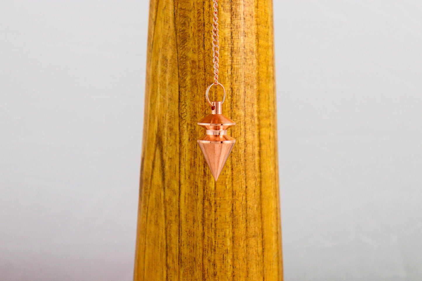 Pendule Triangle - Laiton cuivré